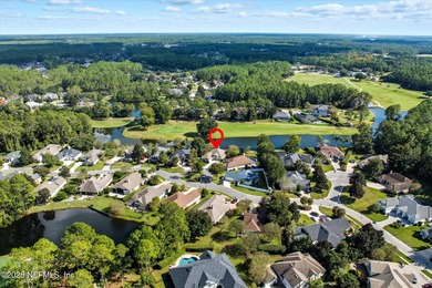 Nestled within the gated golf community of Cimarrone Golf & on Cimarrone Golf and Country Club in Florida - for sale on GolfHomes.com, golf home, golf lot