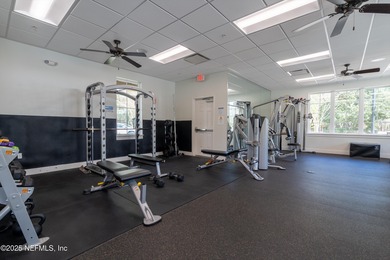 Nestled within the gated golf community of Cimarrone Golf & on Cimarrone Golf and Country Club in Florida - for sale on GolfHomes.com, golf home, golf lot