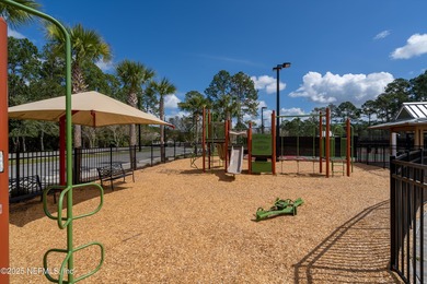 Nestled within the gated golf community of Cimarrone Golf & on Cimarrone Golf and Country Club in Florida - for sale on GolfHomes.com, golf home, golf lot