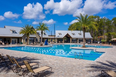 Nestled within the gated golf community of Cimarrone Golf & on Cimarrone Golf and Country Club in Florida - for sale on GolfHomes.com, golf home, golf lot