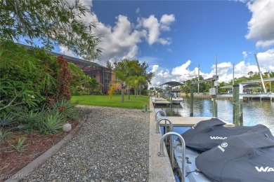 A BOATERS DREAM HOME!! 5 MINUTES TO OPEN WATER, 60 MINUTES TO on Port Charlotte Golf Club in Florida - for sale on GolfHomes.com, golf home, golf lot