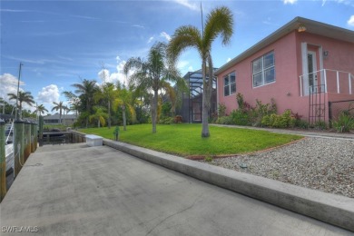 A BOATERS DREAM HOME!! 5 MINUTES TO OPEN WATER, 60 MINUTES TO on Port Charlotte Golf Club in Florida - for sale on GolfHomes.com, golf home, golf lot