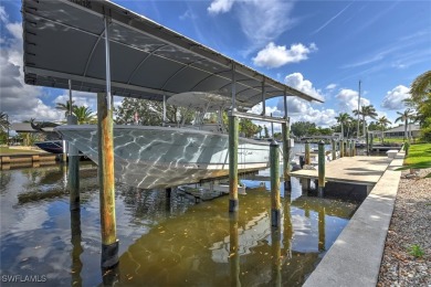 A BOATERS DREAM HOME!! 5 MINUTES TO OPEN WATER, 60 MINUTES TO on Port Charlotte Golf Club in Florida - for sale on GolfHomes.com, golf home, golf lot