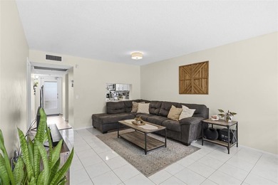 Discover this beautifully updated first-floor 2/2 condo offering on Pine Island Ridge Country Club in Florida - for sale on GolfHomes.com, golf home, golf lot