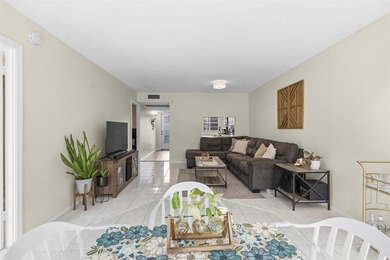 Discover this beautifully updated first-floor 2/2 condo offering on Pine Island Ridge Country Club in Florida - for sale on GolfHomes.com, golf home, golf lot