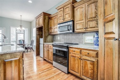 Former model now for sale!  Bright, airy kitchen with breakfast on Golf Club of Creekmoor in Missouri - for sale on GolfHomes.com, golf home, golf lot