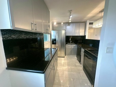 RARE, one-of-a-kind w/ upgrades & GOLF COURSE VIEWS on Kings Point Golf - Executive in Florida - for sale on GolfHomes.com, golf home, golf lot