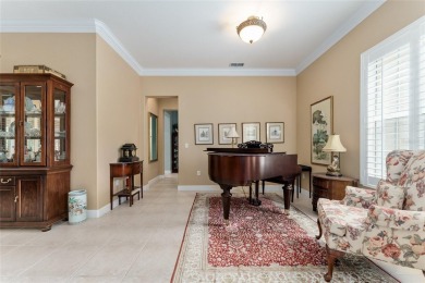 Step into this pristine 2-bedroom, (plus Den/Office/Art on Eagle Ridge At Spruce Creek Country Club in Florida - for sale on GolfHomes.com, golf home, golf lot