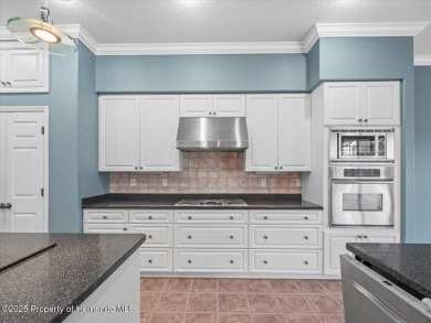 Located in Glen Lakes, this impeccably maintained 2000 built on Glen Lakes Country Club in Florida - for sale on GolfHomes.com, golf home, golf lot