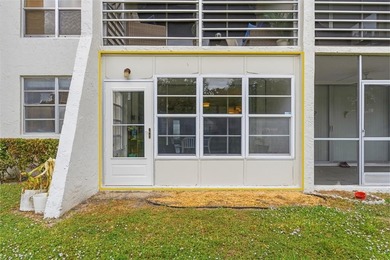 Discover this beautifully updated first-floor 2/2 condo offering on Pine Island Ridge Country Club in Florida - for sale on GolfHomes.com, golf home, golf lot