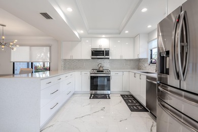 Absolutely gorgeous Bobby Jones model 1st floor, complete on Gleneagles Golf and Country Club in Florida - for sale on GolfHomes.com, golf home, golf lot