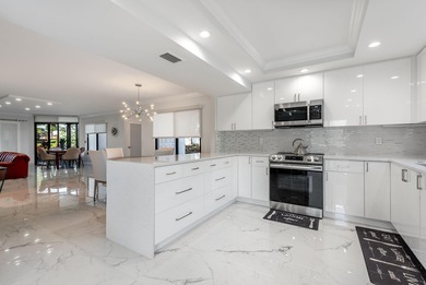 Absolutely gorgeous Bobby Jones model 1st floor, complete on Gleneagles Golf and Country Club in Florida - for sale on GolfHomes.com, golf home, golf lot