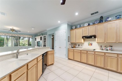 Step into this pristine 2-bedroom, (plus Den/Office/Art on Eagle Ridge At Spruce Creek Country Club in Florida - for sale on GolfHomes.com, golf home, golf lot