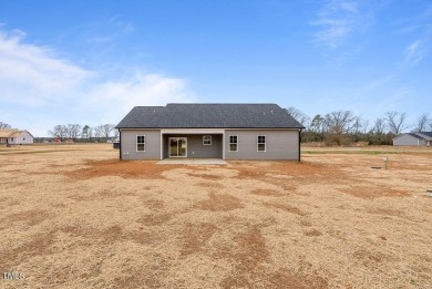 Beautiful custom built home in the highly sought after gated on River Golf and County Club at Lake Royale in North Carolina - for sale on GolfHomes.com, golf home, golf lot