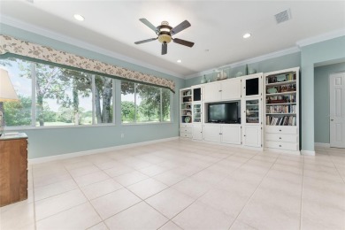 Step into this pristine 2-bedroom, (plus Den/Office/Art on Eagle Ridge At Spruce Creek Country Club in Florida - for sale on GolfHomes.com, golf home, golf lot