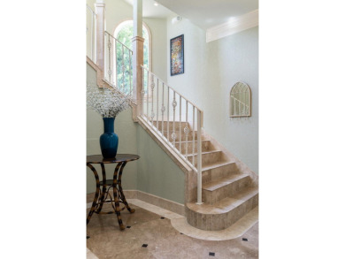 59 Ballamore Cove is a custom-built, one-owner home with Old on Seascape Golf Course in Florida - for sale on GolfHomes.com, golf home, golf lot