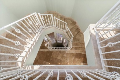 59 Ballamore Cove is a custom-built, one-owner home with Old on Seascape Golf Course in Florida - for sale on GolfHomes.com, golf home, golf lot