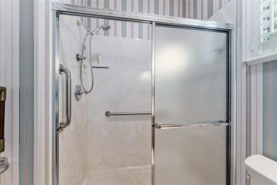 GORGEOUS GOLF COURSE VIEWS - Step into this pristine 2-bedroom on Eagle Ridge At Spruce Creek Country Club in Florida - for sale on GolfHomes.com, golf home, golf lot