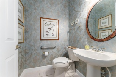 GORGEOUS GOLF COURSE VIEWS - Step into this pristine 2-bedroom on Eagle Ridge At Spruce Creek Country Club in Florida - for sale on GolfHomes.com, golf home, golf lot