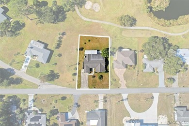 Discover this spacious 4-bed, 3-bath home at 818 N Country Club on Plantation Inn and Golf Resort  in Florida - for sale on GolfHomes.com, golf home, golf lot