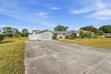 Discover this spacious 4-bed, 3-bath home at 818 N Country Club on Plantation Inn and Golf Resort  in Florida - for sale on GolfHomes.com, golf home, golf lot