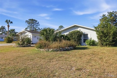 Discover this spacious 4-bed, 3-bath home at 818 N Country Club on Plantation Inn and Golf Resort  in Florida - for sale on GolfHomes.com, golf home, golf lot