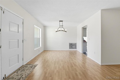 Discover this spacious 4-bed, 3-bath home at 818 N Country Club on Plantation Inn and Golf Resort  in Florida - for sale on GolfHomes.com, golf home, golf lot