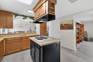 Welcome to this spacious 4-bedroom, 2-bath manufactured home on Indigo Creek Golf Club in South Carolina - for sale on GolfHomes.com, golf home, golf lot