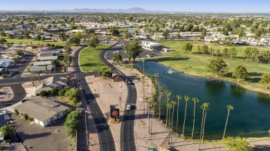 Welcome home to this charming property located in the highly on Fountain of the Sun Country Club in Arizona - for sale on GolfHomes.com, golf home, golf lot