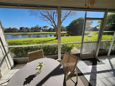 This Lakefront, spacious, furnished, Ground level 3 Bedroom, 2 on Palm-Aire Country Club and Resort - Palms in Florida - for sale on GolfHomes.com, golf home, golf lot