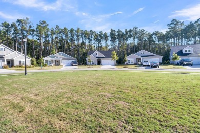 Fantastic one story home full of upgrades and a beautiful wooded on Legend Oaks Plantation Golf Club in South Carolina - for sale on GolfHomes.com, golf home, golf lot