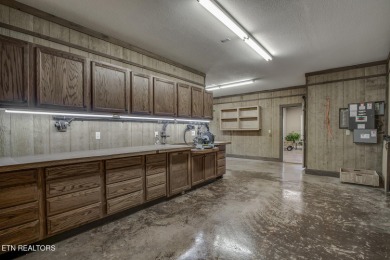 Experience refined living in this stunning 6,513 sq. ft on Wind River Golf Course in Tennessee - for sale on GolfHomes.com, golf home, golf lot
