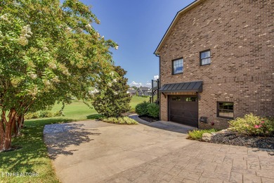 Experience refined living in this stunning 6,513 sq. ft on Wind River Golf Course in Tennessee - for sale on GolfHomes.com, golf home, golf lot
