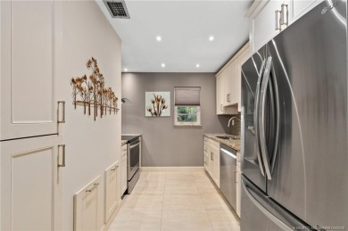 Stunning renovated condo w/ impact windows and unlimited golf in on Monterey Yacht and Country Club in Florida - for sale on GolfHomes.com, golf home, golf lot
