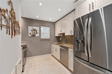 Stunning renovated condo w/ impact windows and unlimited golf in on Monterey Yacht and Country Club in Florida - for sale on GolfHomes.com, golf home, golf lot