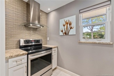 Stunning renovated condo w/ impact windows and unlimited golf in on Monterey Yacht and Country Club in Florida - for sale on GolfHomes.com, golf home, golf lot