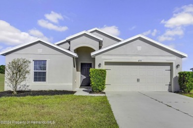 The scenic vistas of Sherman Hills Golf Club serve as a serene on Sherman Hills Golf Club in Florida - for sale on GolfHomes.com, golf home, golf lot