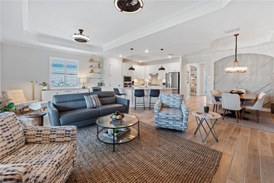 Enjoy expansive golf course views and spectacular western on Lakewood National Golf Club in Florida - for sale on GolfHomes.com, golf home, golf lot