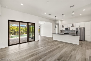 This home has all of the boxes checked!  Built 2022! Split on Royal Tee Country Club in Florida - for sale on GolfHomes.com, golf home, golf lot