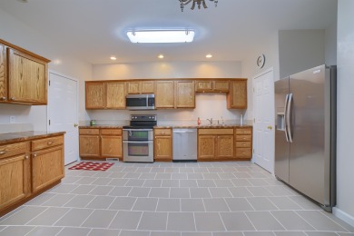 Experience a beautiful balance of style and convenience in this on Ellis Country Club in Kansas - for sale on GolfHomes.com, golf home, golf lot