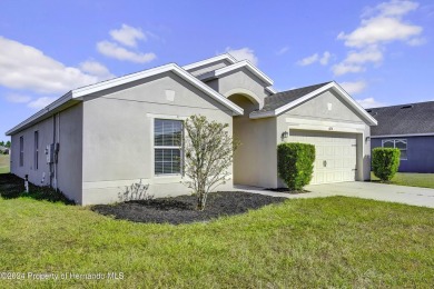 The scenic vistas of Sherman Hills Golf Club serve as a serene on Sherman Hills Golf Club in Florida - for sale on GolfHomes.com, golf home, golf lot