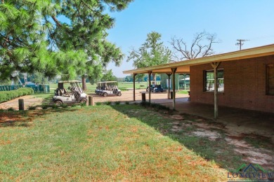 Nestled within the serene surroundings of the classic Longview on Longview Country Club in Texas - for sale on GolfHomes.com, golf home, golf lot