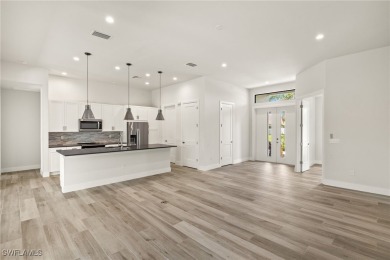 This home has all of the boxes checked!  Built 2022! Split on Royal Tee Country Club in Florida - for sale on GolfHomes.com, golf home, golf lot