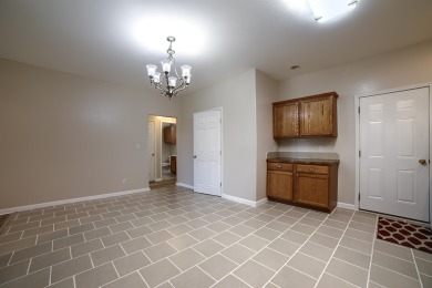 Experience a beautiful balance of style and convenience in this on Ellis Country Club in Kansas - for sale on GolfHomes.com, golf home, golf lot
