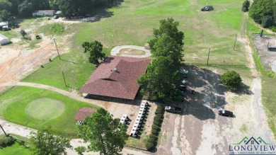 Nestled within the serene surroundings of the classic Longview on Longview Country Club in Texas - for sale on GolfHomes.com, golf home, golf lot