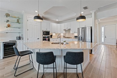 Enjoy expansive golf course views and spectacular western on Lakewood National Golf Club in Florida - for sale on GolfHomes.com, golf home, golf lot