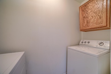 Experience a beautiful balance of style and convenience in this on Ellis Country Club in Kansas - for sale on GolfHomes.com, golf home, golf lot
