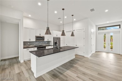 This home has all of the boxes checked!  Built 2022! Split on Royal Tee Country Club in Florida - for sale on GolfHomes.com, golf home, golf lot