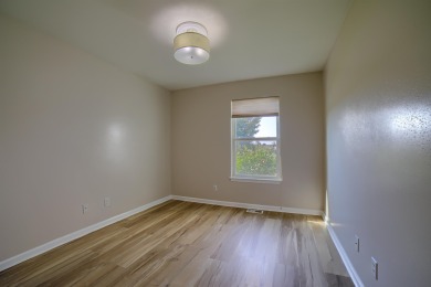 Experience a beautiful balance of style and convenience in this on Ellis Country Club in Kansas - for sale on GolfHomes.com, golf home, golf lot