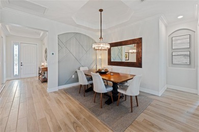 Enjoy expansive golf course views and spectacular western on Lakewood National Golf Club in Florida - for sale on GolfHomes.com, golf home, golf lot